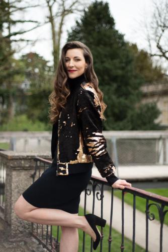 Eve-Maud Hubeaux  with black and gold dress